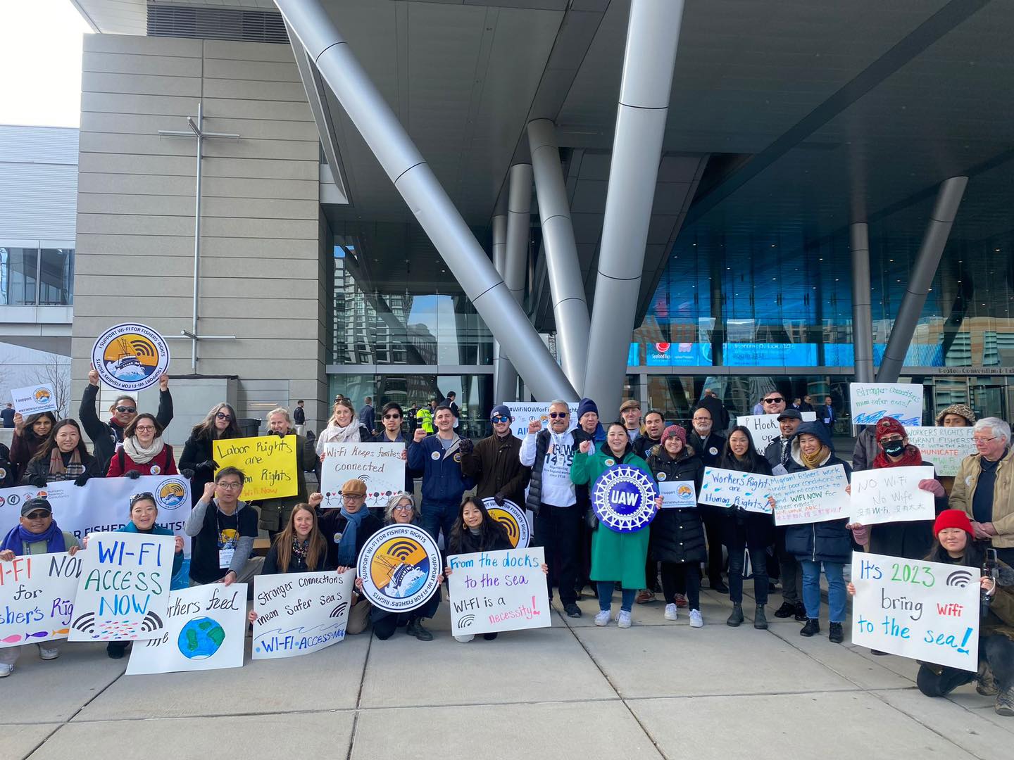 NGO groups including from Taiwan demonstrate outside the Seafood Expo North America in Boston. (Photo: Wi-Fi Now for Fishers’ Rights at Sea)