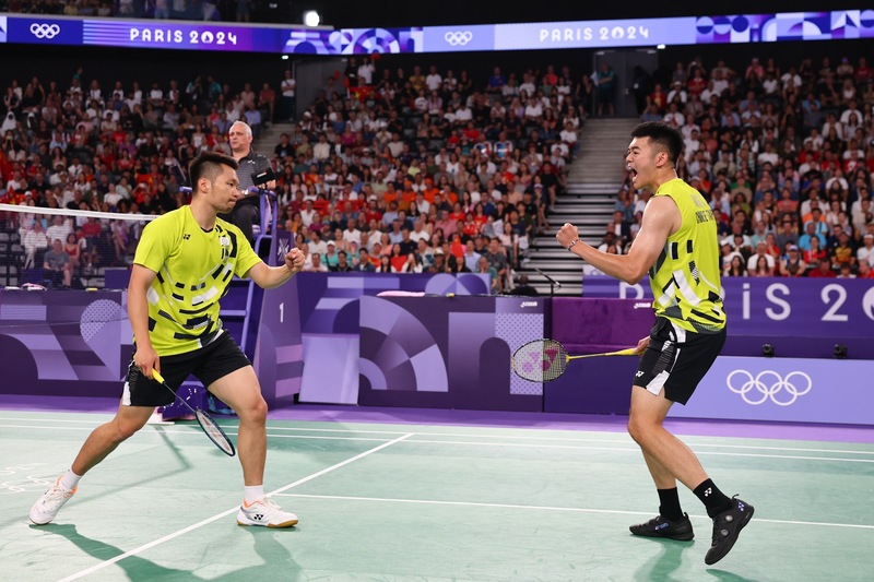Lee Yang (李洋) et Wang Chi-lin (王齊麟) lors de la finale olympique à Paris (photo CNA)