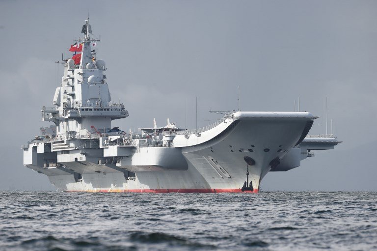 Le porte-avions chinois Liaoning (photo, AFP)