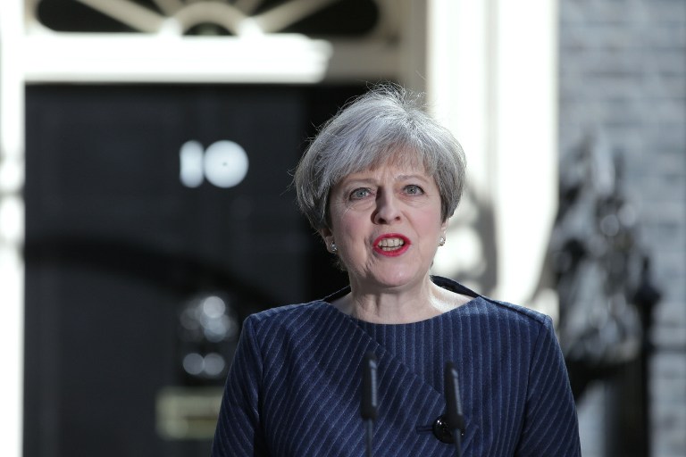 英國首相梅伊(Theresa May)18日突然宣布，將要求於6月8日提前舉行國會大選。 (AFP)