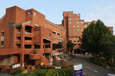 立法院7日三讀通過發展觀光條例部分條文修正草案，將救國團青年活動中心等完成旅館業登記的期限展延5年。救國團今天表示，透過修法可持續造福青年，相關作業會在限期內處理。(圖：中央社)