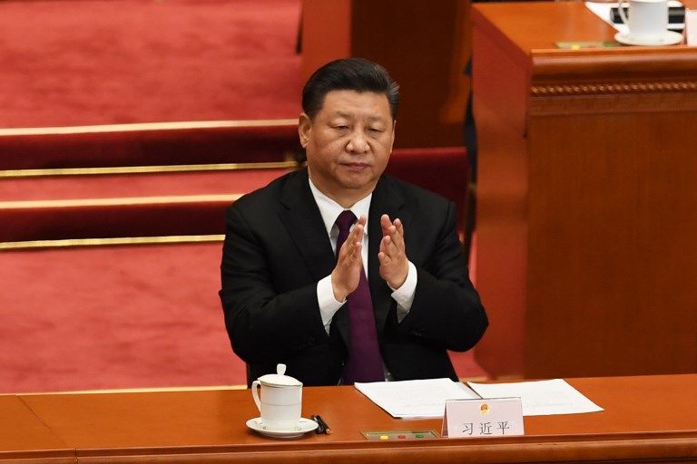 中國國家主席習近平在今年3月宣佈成立中共中央金融工作委員會，圖為3月17日習近平出席全國人大會議。(AFP)