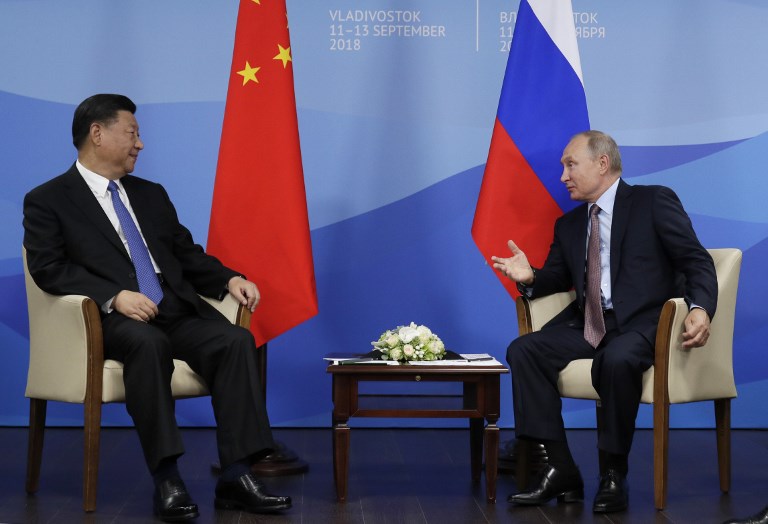 俄羅斯總統蒲亭(Vladimir Putin)和中國國家主席習近平16日聯手，反駁西方指控北京遲滯疫情通報、拖累全球應變的說法。（檔案照片/AFP）