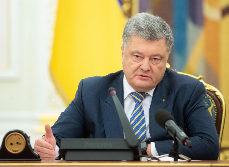 烏克蘭前總統波洛申科(Petro Poroshenko)將在17日返國。  (AFP)