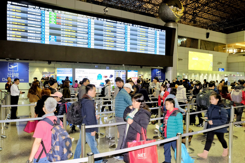 春節連假旅運創新高，桃機湧15萬出入境旅客。(資料照片/CNA)
