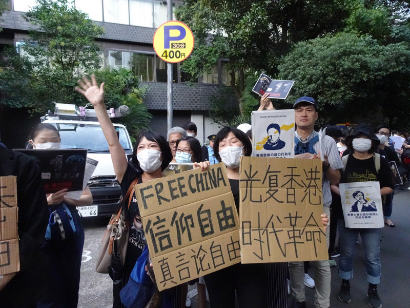 東京29日有一場「撐香港」的遊行活動，旅日港人喊出「光復香港、時代革命」，反對中國政府將手伸進香港特區。(中央社)
