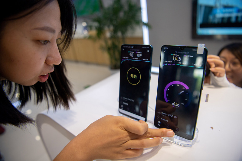 中國從12月1日起申辦手機門號必須做人臉辨識。（檔案照片/中央社）