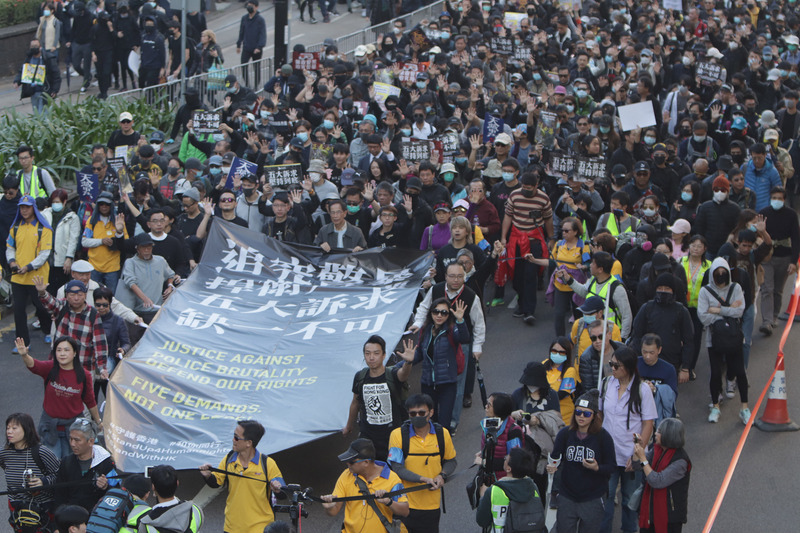 圖為香港民陣2019年的示威遊行。(圖:中央社檔案照片)