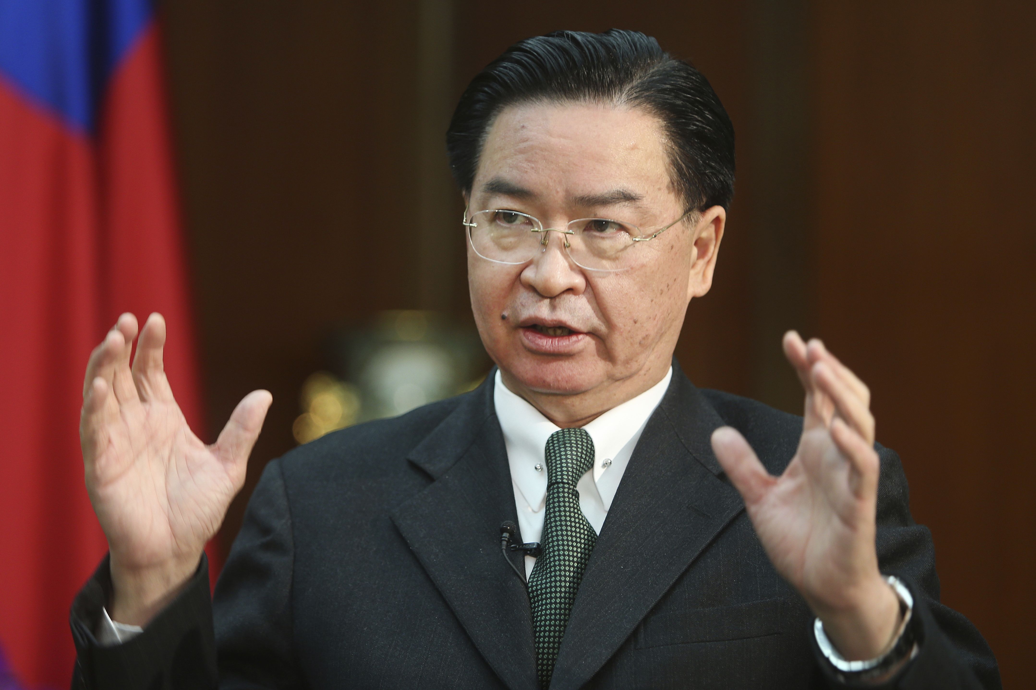 外交部長吳釗燮表示，在台灣紀念1947年2月28日的大屠殺，並對威權主義說「不」的同時，很難過得知黎智英被逮捕的訊息。(美聯社/達志影像)