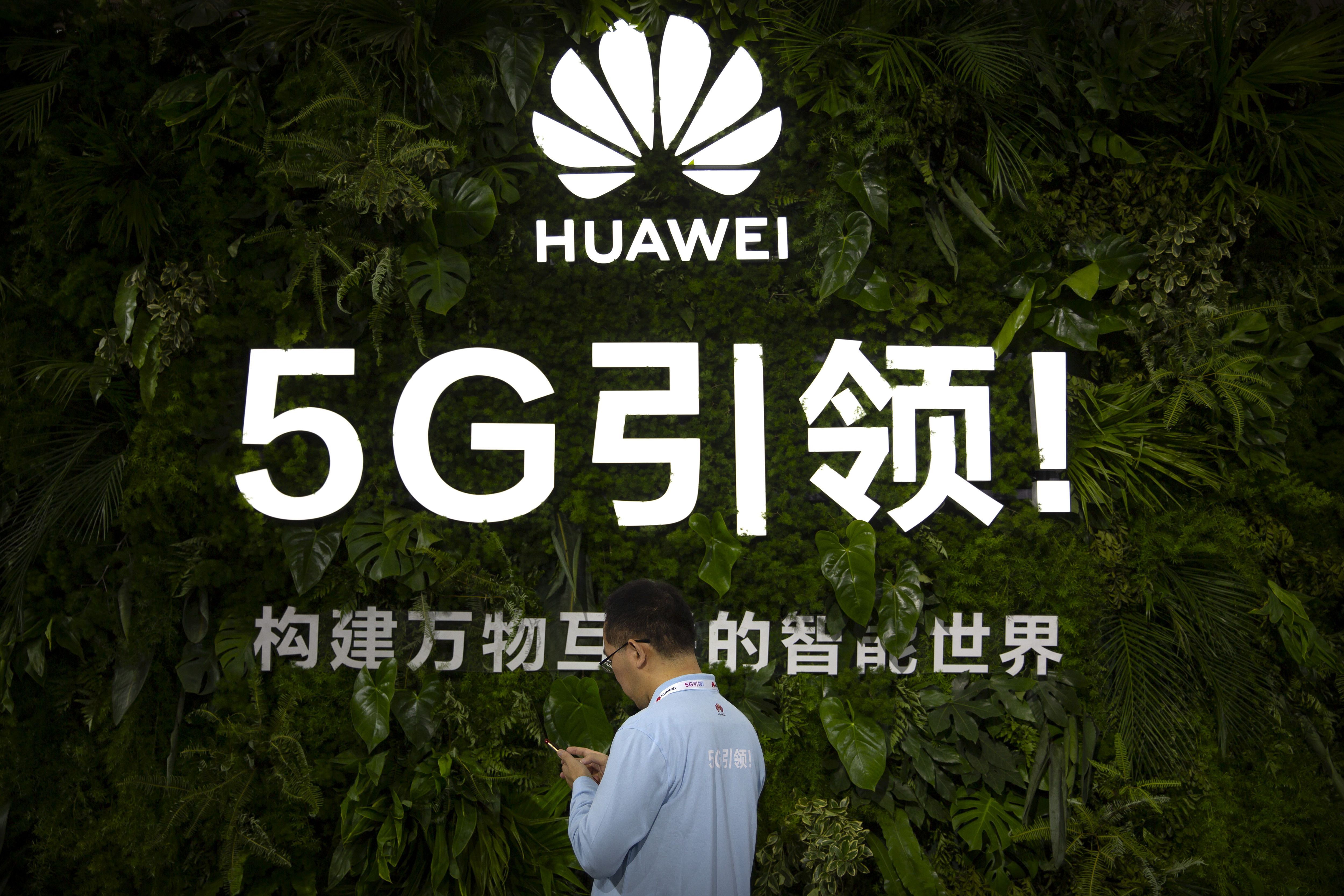 美修改禁令，企業可與華為合作訂5G標準。(美聯社/達志影像)