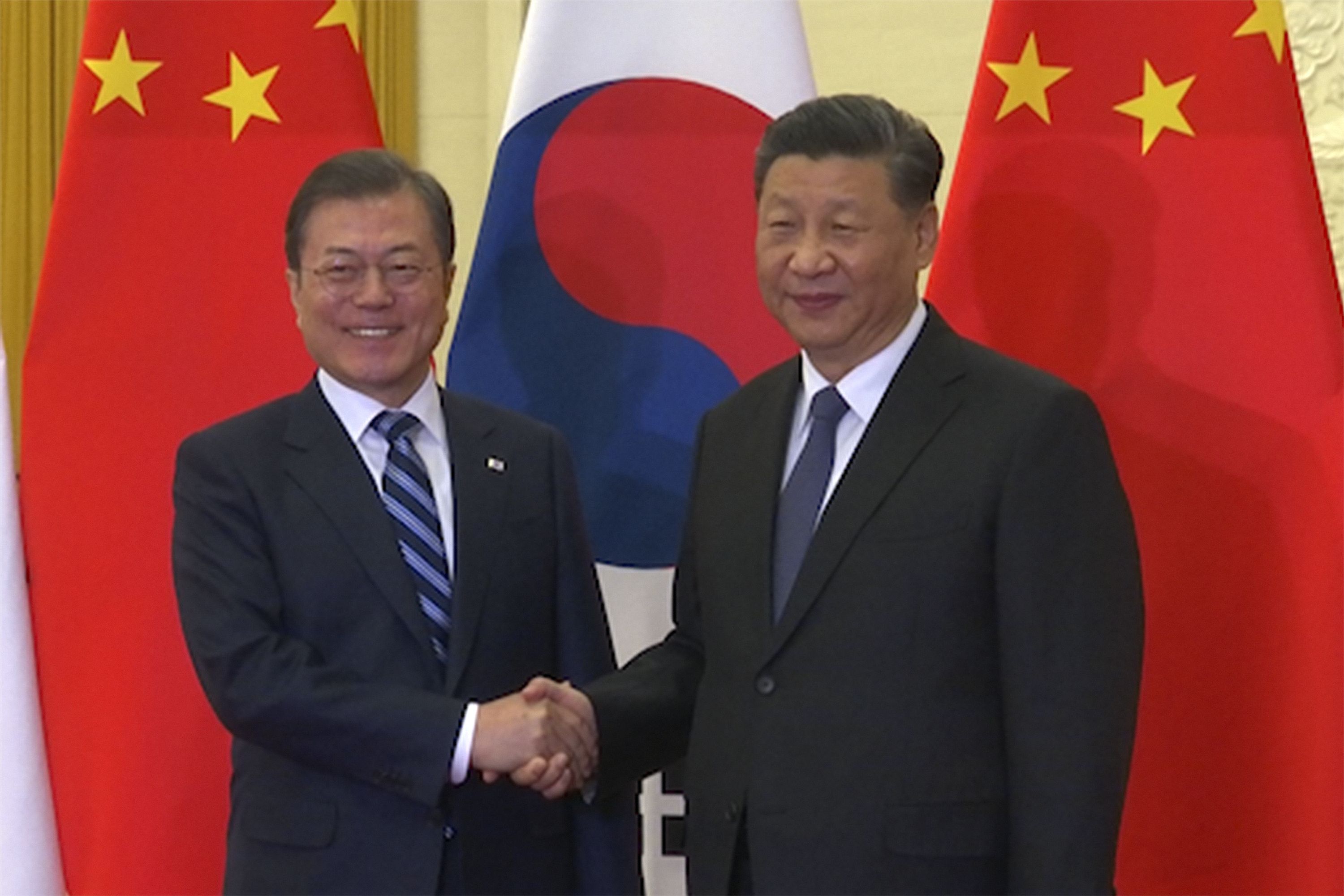 南韓總統文在寅23日在北京與中國國家主席習近平舉行會談。 (美聯社/達志影像)