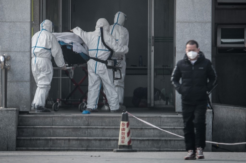 中國武漢華南海鮮市場從去年12月起爆發不明原因肺炎，病原體經判定後為一種新型冠狀病毒。(AFP)