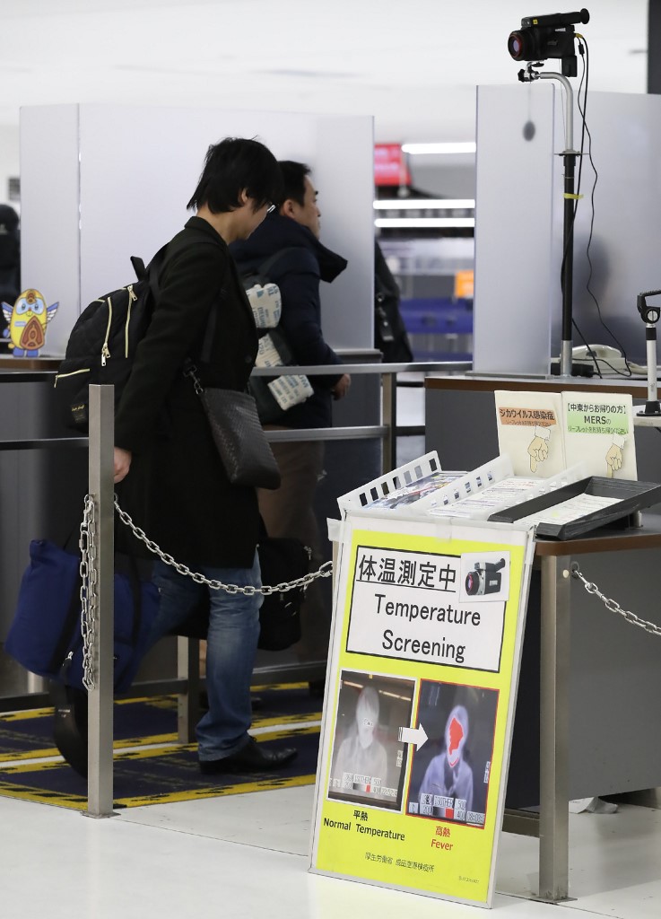 日本厚生勞動省11日表示，上月底搭乘從中國湖北省武漢包機返國的2名日本人確診感染2019新型冠狀病毒(2019-nCoV，俗稱武漢肺炎)。(AFP)