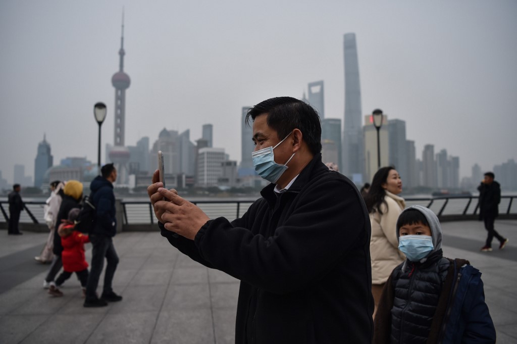 武漢肺炎擴散，美升高中國旅遊警示籲三思後行。 (AFP)