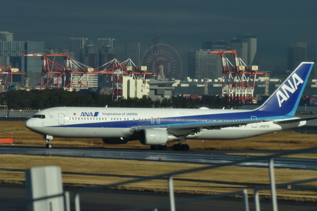 武漢肺炎延燒，日本考慮再派包機撤僑。(圖／法新社)