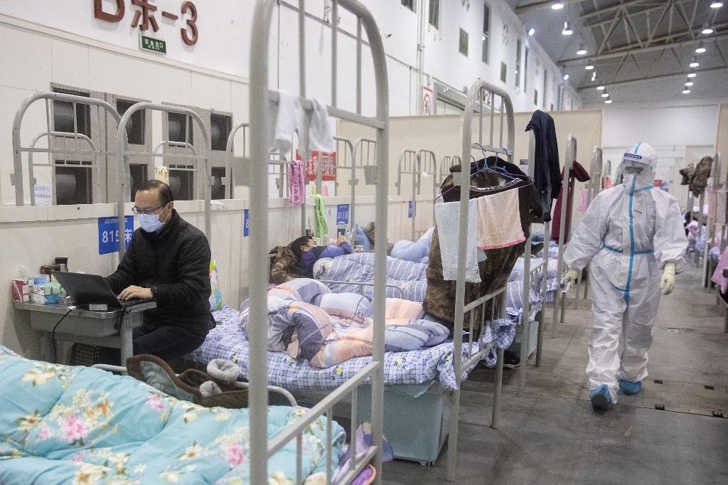 中國維權律師組法律顧問團，助武漢肺炎受害者索賠。圖為專門收治武漢肺炎患者的方艙醫院。(AFP)