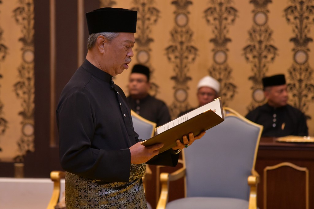 馬來西亞新首相慕尤丁(Muhyiddin Yassin)今天(9日)宣布內閣名單，名單中暫時沒有副首相人選，倒是設立4位高級部長職位來作為副手。(AFP)