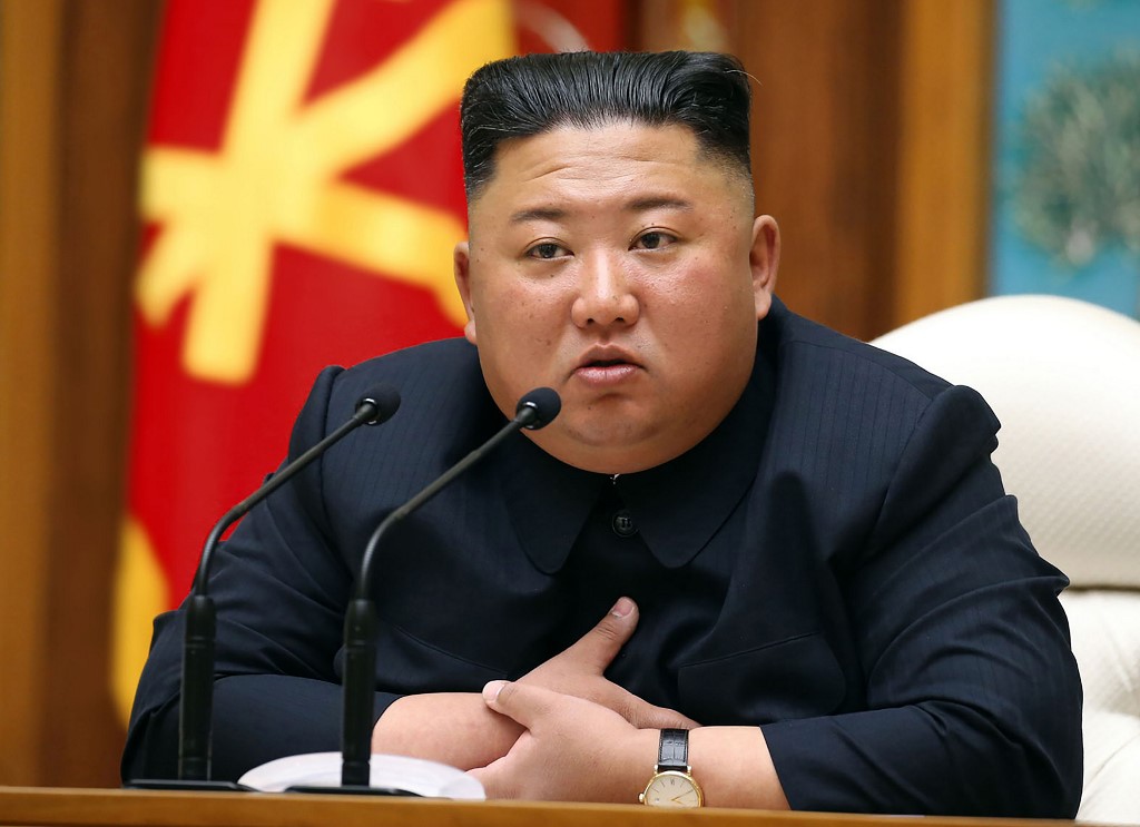 川普確診，金正恩祝他早日康復。 (AFP)