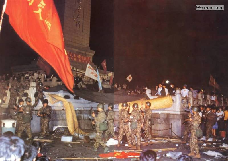 六四凌晨五時，穿迷彩軍服的特種作戰部隊士兵衝上人民英雄紀念碑驅趕學生。(圖: 六四檔案)