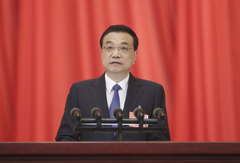 中國國務院總理李克強22日出席第13屆全國人民代表大會第三次會議開幕式，並進行政府工作報告。（中新社提供）