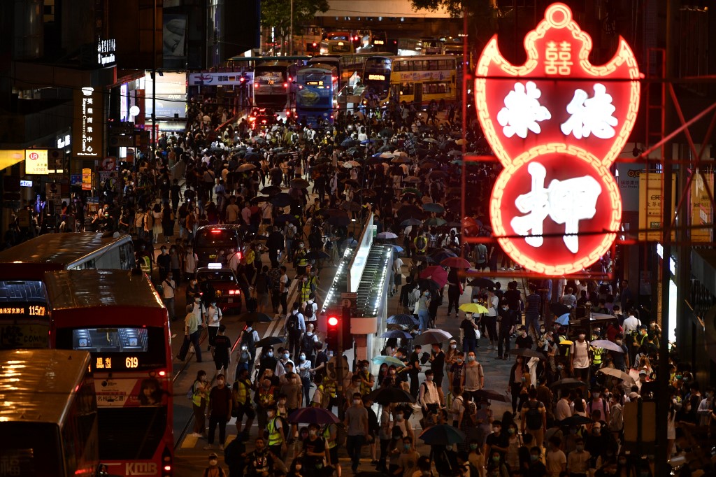 反送中一周年，港人再度上街遊行。(AFP)