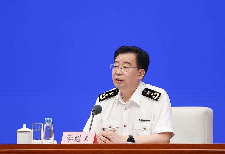 中國突然暫停進口我多家食品廠產品。圖為中國海關總署發言人李魁文。(圖/百度)