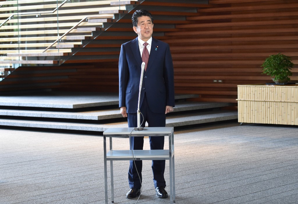即將卸任的日本首相安倍晉三16日對媒體發表談話。(AFP)