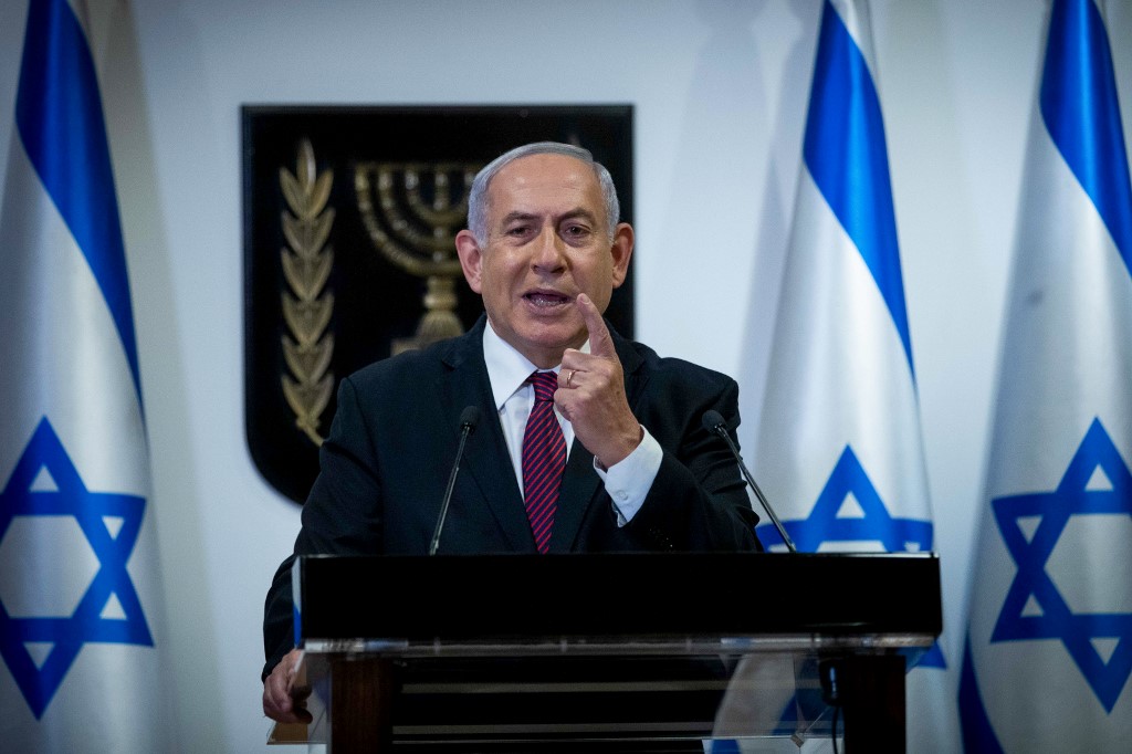 以色列總理尼坦雅胡(Benjamin Netanyahu)22日在國會發表演說。 (AFP)