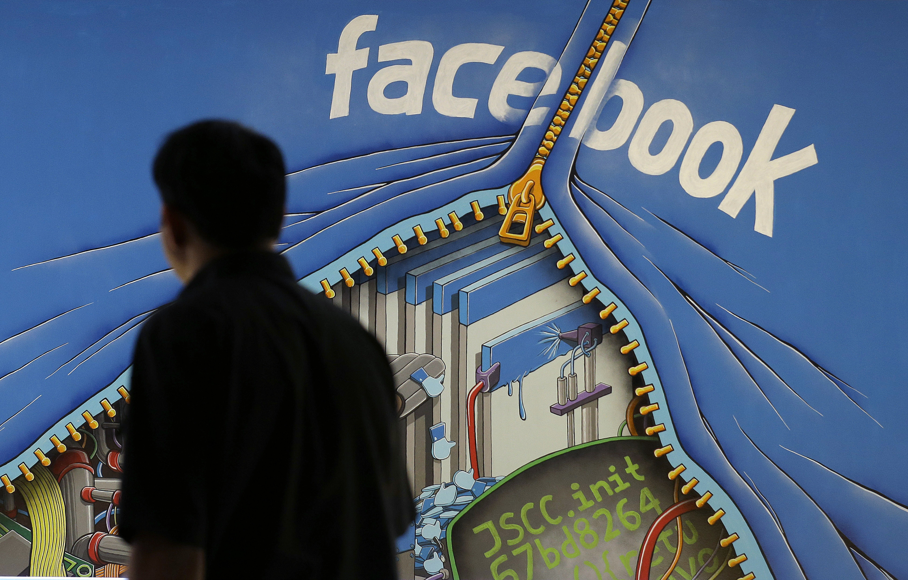 臉書(Facebook)表示，已與部分法國報紙達成協議，將為其用戶分享的新聞內容付費。(美聯社/達志影像)