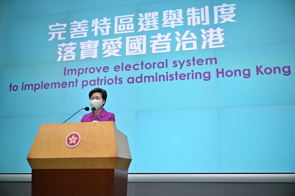 香港特首林鄭月娥稍早前赴北京出席「兩會」會議，返港後在8日中午會晤媒體。 (AFP)