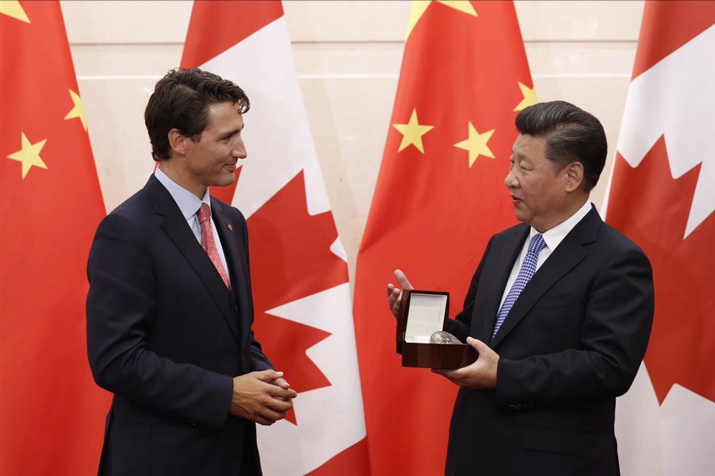 享有聲譽的HFX論壇有意頒獎給蔡英文總統，但加拿大政府傳擔心激怒中國擬不再贊助。圖為2016年9月加拿大總理杜魯道（左）與中國國家主席習近平（右）會面。（推特）