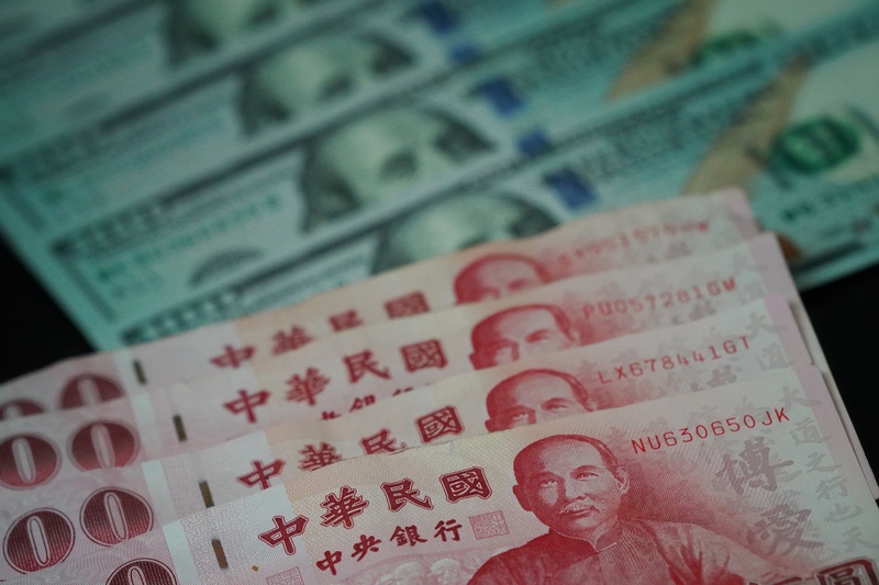 美國大量印鈔終將自食惡果？新台幣2024年前難回30關。(資照照片／中央社)
