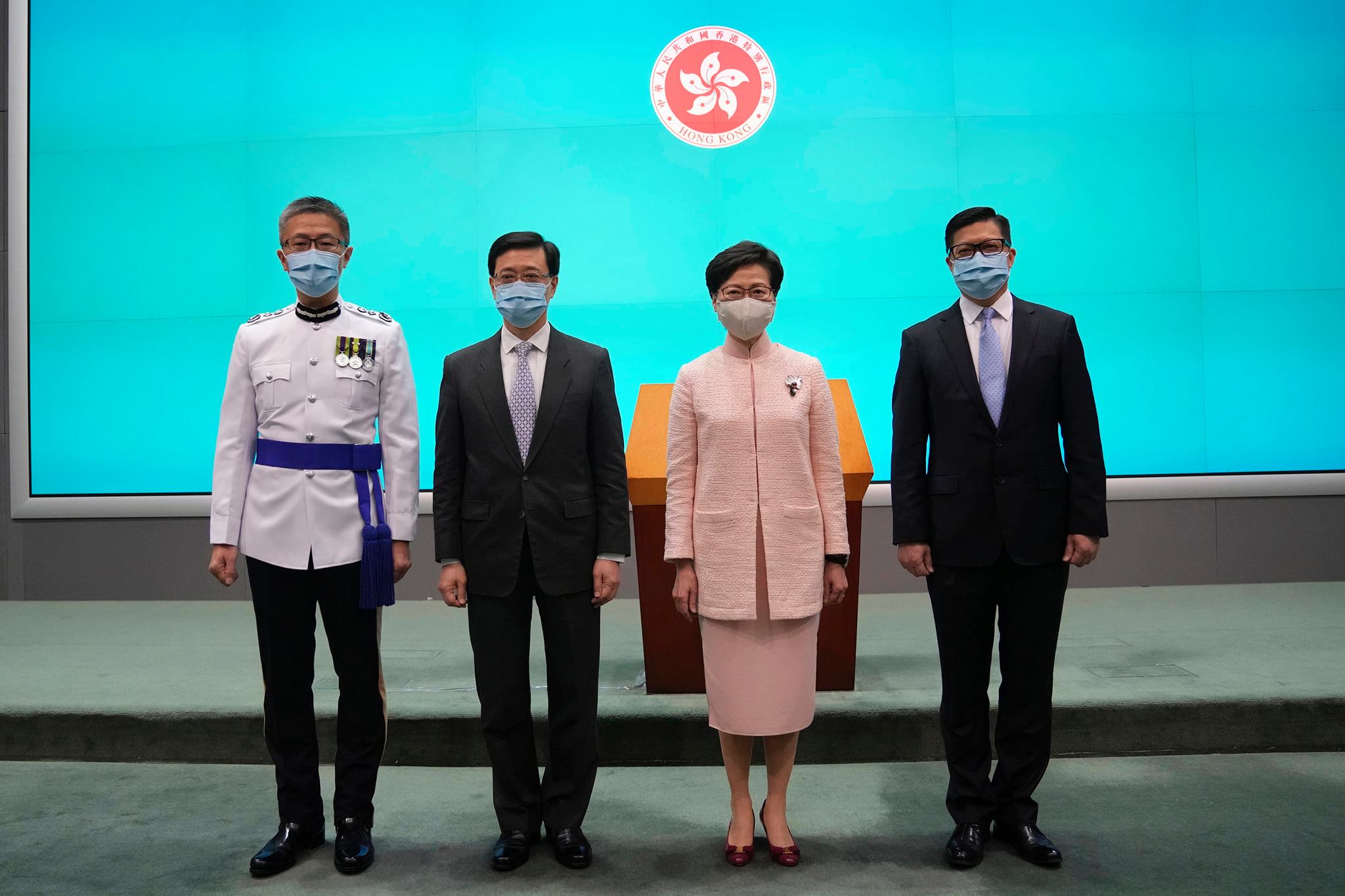 根據林鄭月娥的提名和建議，任命香港保安局局長李家超為政務司司長，警務處處長鄧炳強接任保安局局長，警務處副處長蕭澤頤升任處長。(美聯社/達志影像)