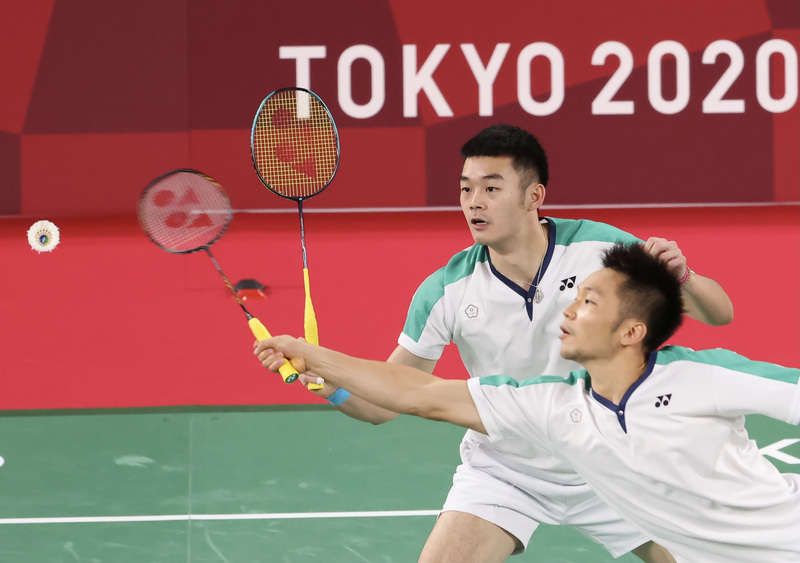 羽球男雙「麟洋配」在本屆奧運奪金寫下歷史。 (圖：中央社)