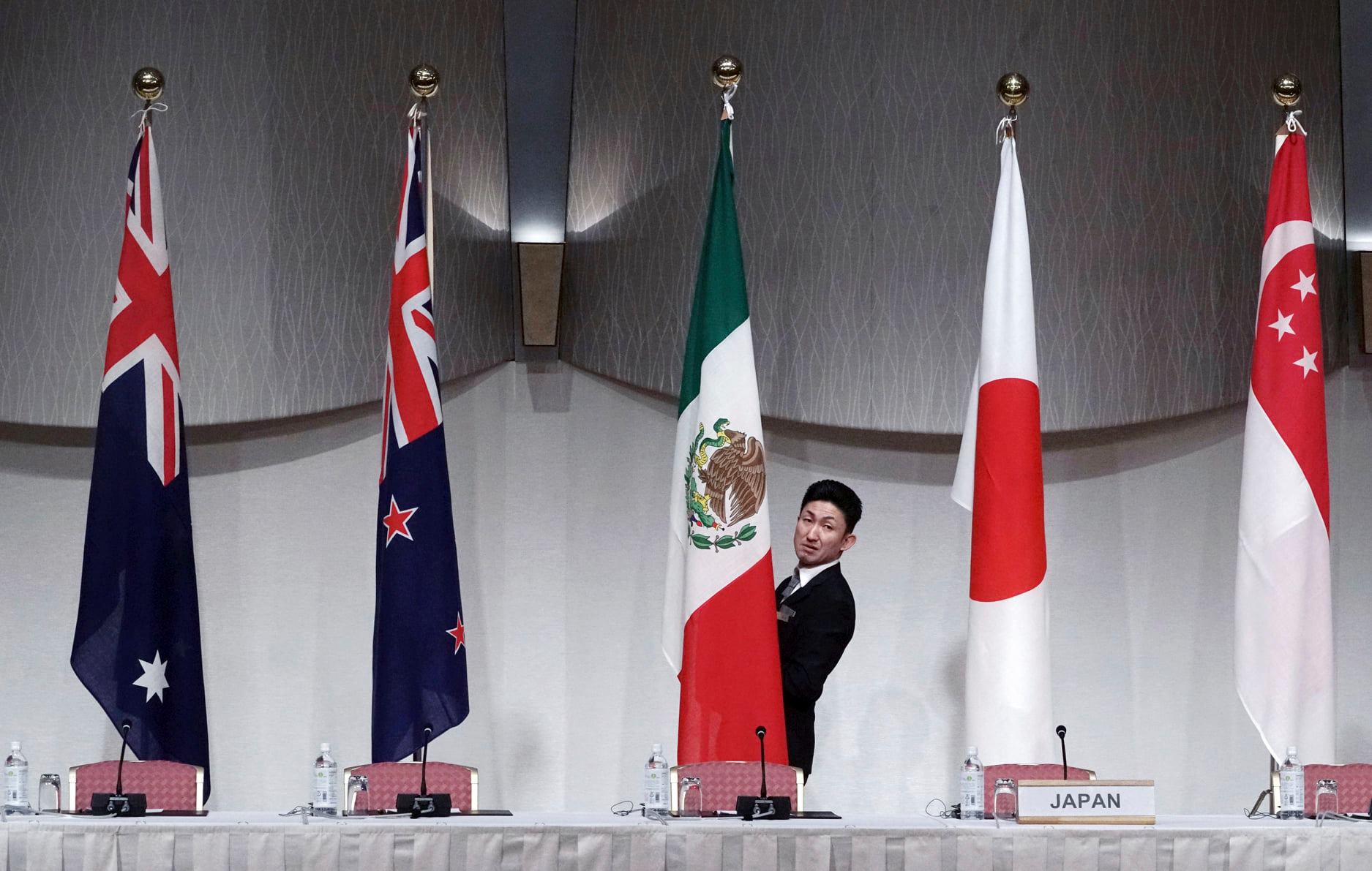 中國申請加入「跨太平洋夥伴全面進步協定」(CPTPP)，日媒認為中國想趁美國不在，逆轉區域協定重心。(美聯社/達志影像)