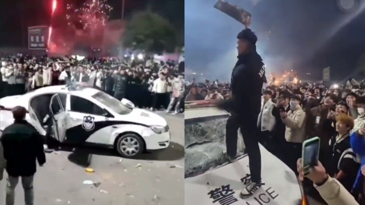 河南周口市鹿邑民眾包圍並打砸警車( 圖：推特)