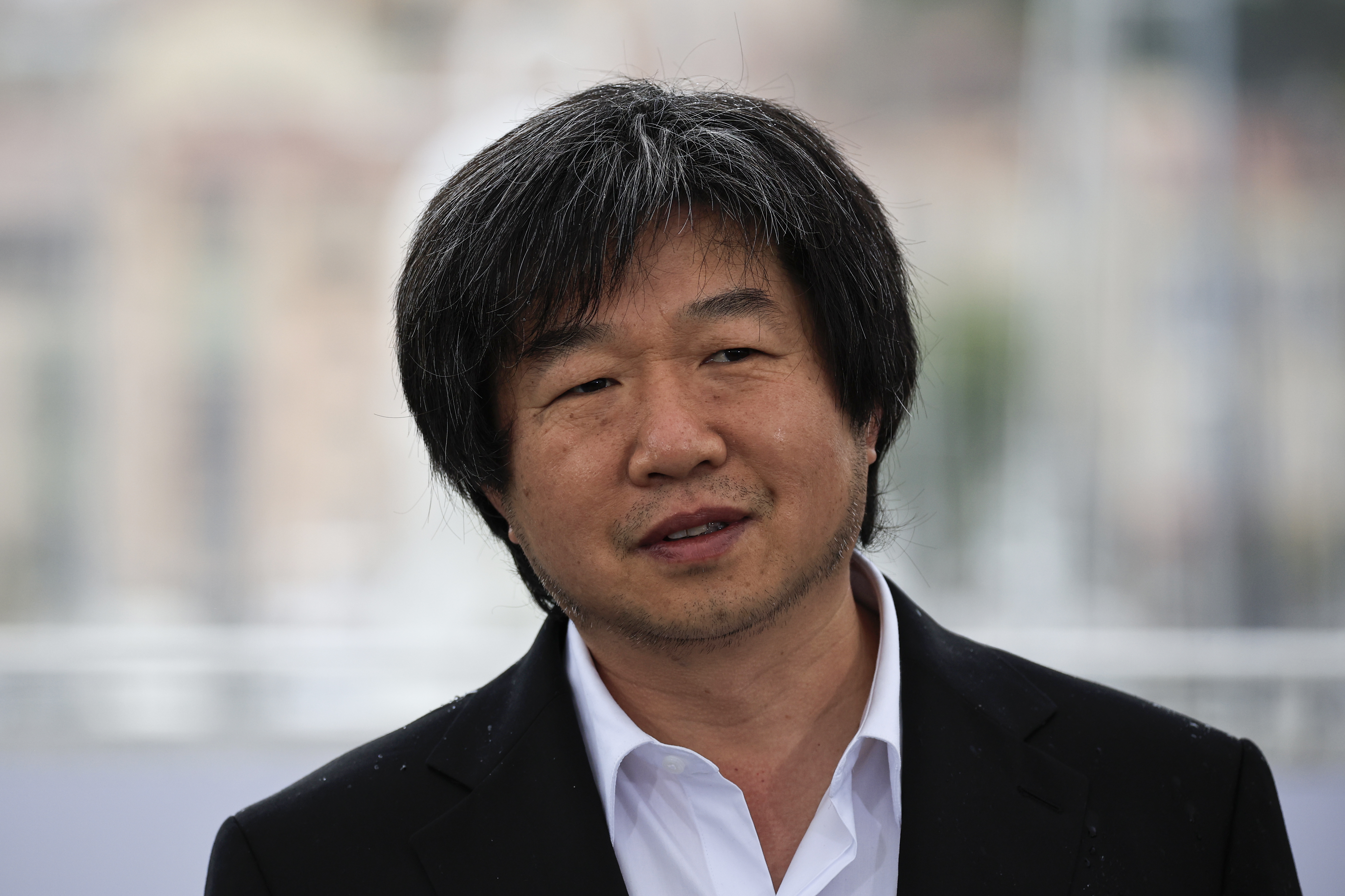 中國導演王兵執導的紀錄片「青春」入圍2023年坎城影展主競賽單元。(AFP)