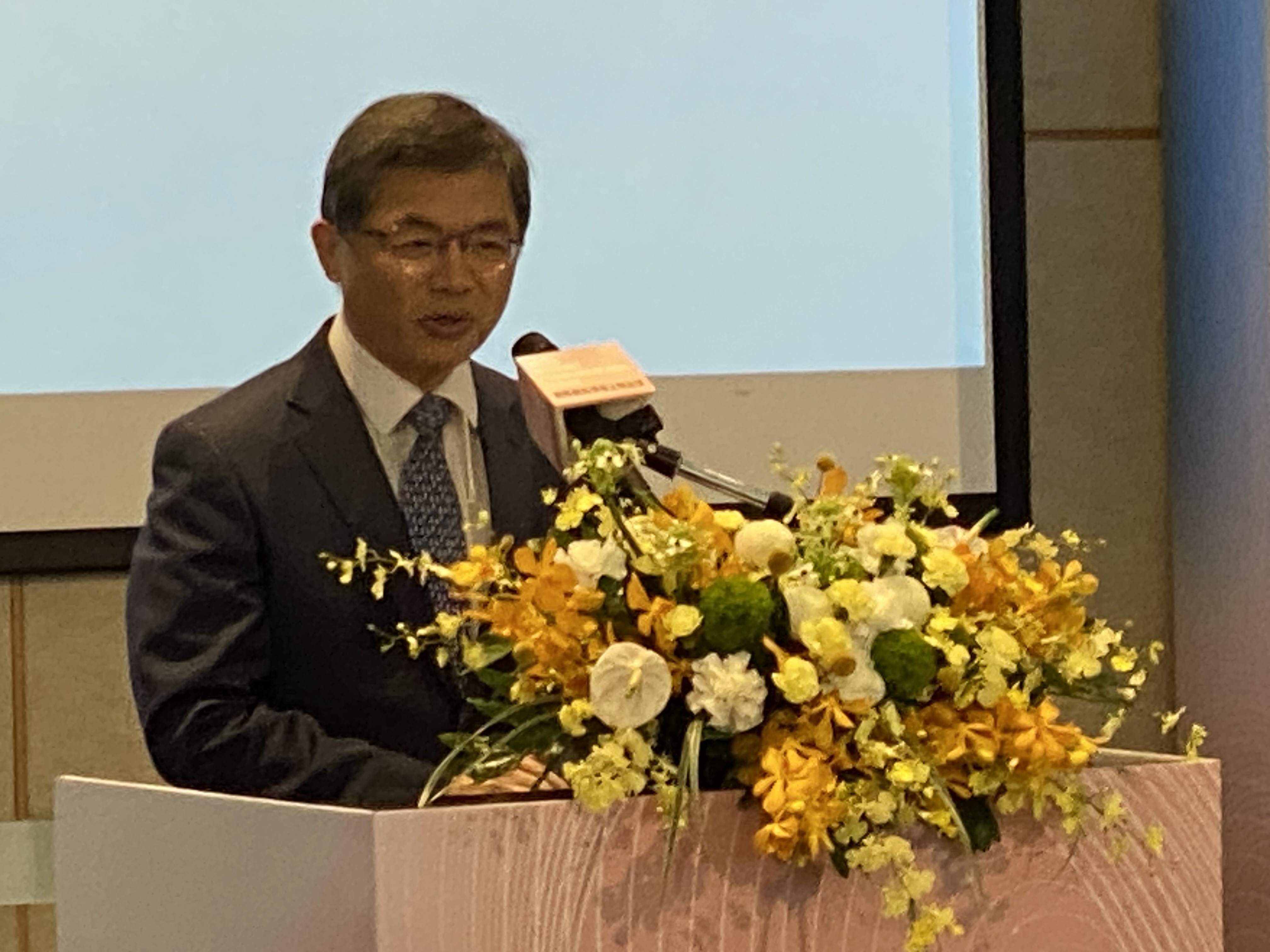 行政院秘書長李孟諺14日出席「2023網際網路傳播治理論壇」開幕致詞。(吳琍君攝)