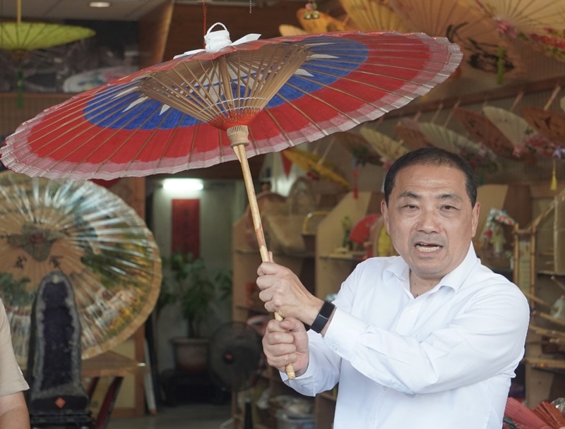 國民黨總統參選人侯友宜表示，當選後將提出百億客家發展基金，並制定客家語言發展法。(圖：中央社)
