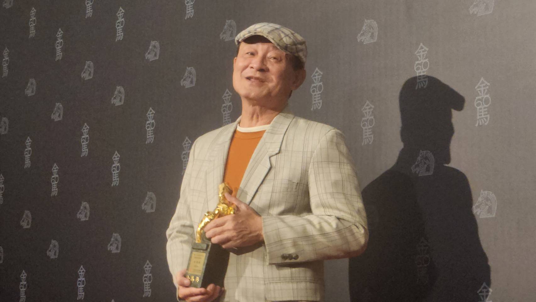 新科金馬最佳男配角得主持陳慕義。(江昭倫 攝)