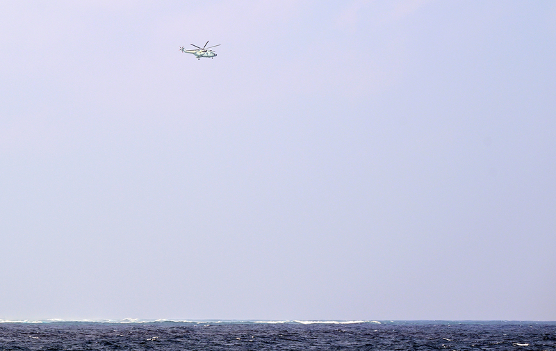 菲律賓海岸防衛隊今天(18日)指控中國海軍在南海(South China Sea)進行危險飛行，當時一架隸屬菲律賓政府的飛機在當地爭議島礁進行巡邏時，遭中國海軍直升機逼近。 (示意圖：中央社)