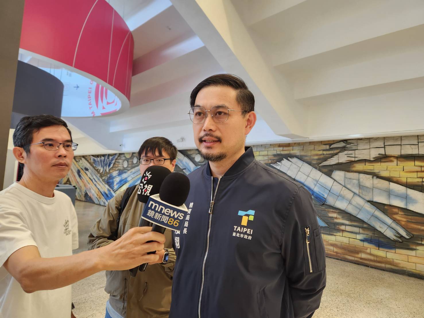明年大巨蛋中職例行賽僅20場挨批，台北市體育局長王泓翔表示，根據合約，大巨蛋非運動賽事舉辦比例不能超過50％，呼籲遠雄公開活動檔期比例。(江昭倫 攝)