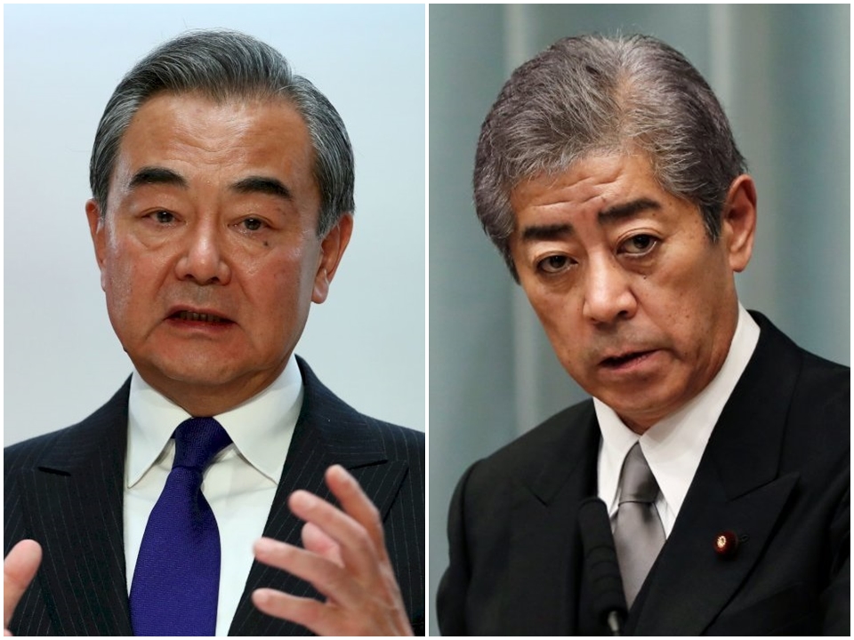 中國外長王毅(左)25日將在北京與日本外務大臣岩屋毅(右)舉行會談。(合成圖/路透社/達志影像)