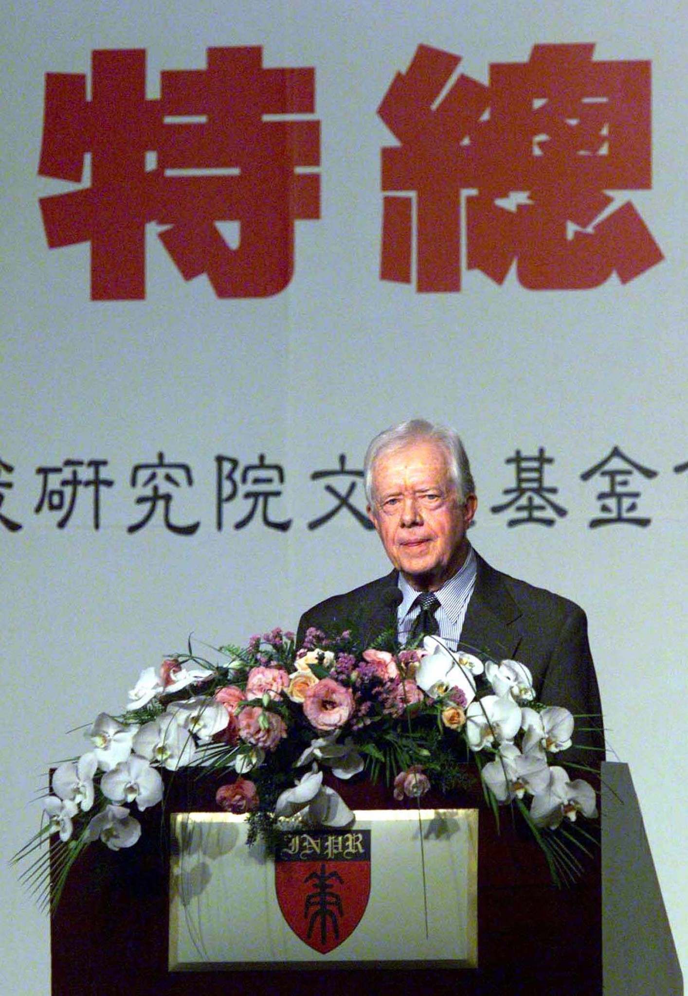 美國前總統卡特1999年3月30日在台北演講。那是他在美國與中國建交20年後首次訪台。(路透社/達志影像)